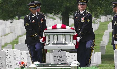 An Army honor 
guard carries the coffin of Staff Sgt. Duane J. Dreasky, of Novi, 
Mich., at Arlington National Cemetery