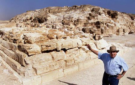 Zahi Hawass, Egypt's top archaeologist and the director of Egypt's Supreme Council of the Antiquities points to the 110th pyramid to be uncovered in Egypt, Sunday, May 5, 2002, at a site near Cairo. Photo by Amr Nabil