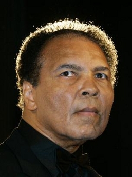 Boxing legend Muhammad Ali poses for photographers during the award ceremony for the Otto-Hahn-Peace-Medal 2005 of the German Society of the United Nations in Berlin, Saturday, Dec. 17, 2005.  Photo by Franka Bruns