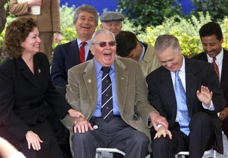 Actor Andy Griffith, center, shares a laugh with North Carolina Gov. MIke Easley, right, and Griffith's wife, Cindi, left, after the governor was mistakenly introduced as former Gov. Jim Hunt during a ceremony naming part of U.S. Hwy 52 the Andy Griffith Parkway during a ceremony in Griffith's hometown of Mount Airy, N.C., Wednesday Oct. 16, 2002. Photo by Chuck Burton