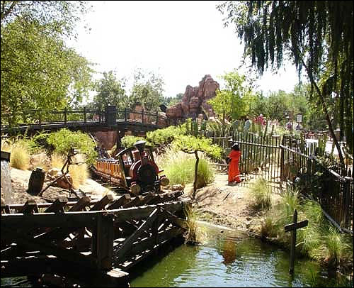 The figure of a Guantanamo Bay detainee wearing a hood and shackles was placed inside the Big Thunder Mountain Railroad ride at Disneyland. Photo courtesy of http://www.woostercollective.com/