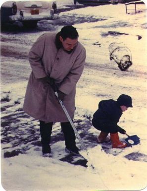 Al and Dave Romm shoveling snow