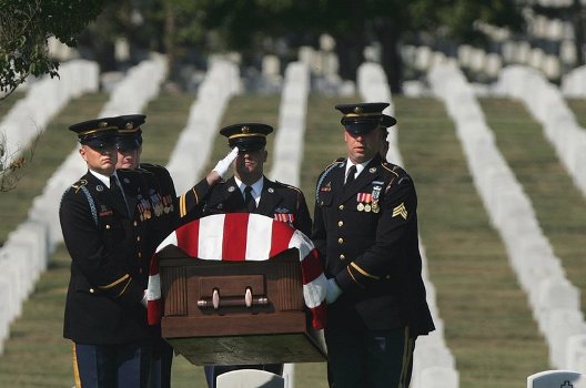 An Army honor guard 
carries the casket of Army Sgt. Michael C. Hardegree, of Villa Rica, 
Ga., during funeral services at Arlington National Cemetery in 
Arlington, Va