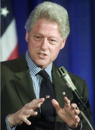 Former President Bill Clinton addresses the Democratic Leadership Council in Washington Thursday, April 11, 2002. Photo by Rick Bowmer