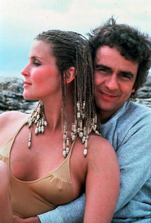 Dudley Moore embraces actress Bo Derek during the filming of '10' in this 1979 file photo