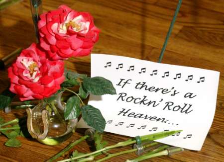 A sign and flowers are some of the many items fans dropped off in front of The Joint inside the Hard Rock Hotel & Casino in Las Vegas at a memorial for 