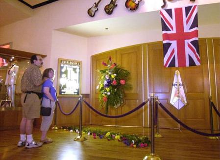 Richard and Debbie Lane of Boston look at a makeshift shrine at the Hard Rock Hotel in Las Vegas Thursday June 27, 2002. The Lanes came to Las Vegas for The Who concert, which was to be held Friday at the theater in the Hard Rock Hotel. Photo by Joe Cavaretta