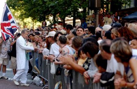 Actor Sir Ian McKellen greets the crowd while holding the British flag during the San Francisco Lesbian, Gay, Bisexual, and Transgender Pride Parade held on Sunday, June 30, 2002. Photo by Jakub Mosur