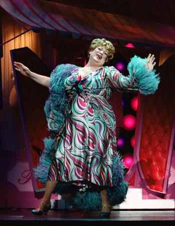 Actor Harvey Fierstein is shown performing in a scene from ''Hairspray'' in New York. The buzz is building for ''Hairspray,'' and although the $10.5 million musical is still in previews and doesn't open at the Neil Simon Theatre until Aug. 15, its already being burbled about as ''the next Producers,''' Broadways hottest show. Critics won't see it until close to the opening. Photo by Paul Kolnik