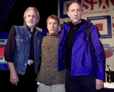 John Entwhistle (L) is shown at a press conference in this April 10, 2000 file photograph with other members of the group Roger Daltry (C), and Pete Townshend. Photo by Peter Morgan