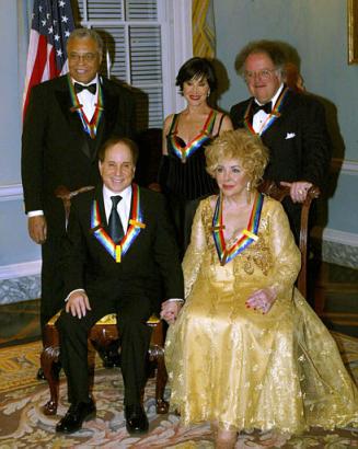 James Earl Jones, Chita Rivera, James Levine, from left to right back row, with Paul Simon and Elizabeth Taylor, from left to right front row, pose for a picture as Kennedy Center Honorees for 
their lifetime contributions to the performing arts at the U.S. State Department, Saturday, Dec. 7, 2002, in Washington. Photo by Lawrence Jackson