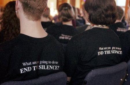 Students from Kalamazoo, Mich., area high schools participate in the Day of Silence by wearing t-shirts Wednesday, April 10, 2002. Photo by Adam Bird