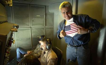 NBC's Tonight Show host Jay Leno(r), country music singer Dwight Yoakam (l) & MSgt. Cody Crowder aboard an Air Force KC-10A Extender aircraft, 60th Air 
Mobility Wing, Travis Air Force Base.  Photo by MSgt. Dave Nolan