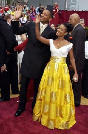 Best actor nominee Will Smith arrives with his wife Jada Pinkett Smith at the 74th Academy Awards on Sunday, March 24, 2002. Photo by Laura Rauch