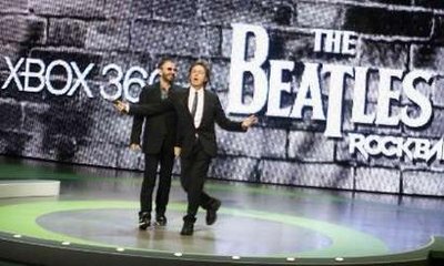 Ringo Starr (L) and Paul McCartney, of The Beatles, introduce the new video game 'The Beatles: Rock Band' at the Microsoft XBox 360 E3 2009 media briefing in Los Angeles June 1, 2009.
  Photo by Fred Prouser 