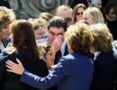 Emeril Lagasse clears his eyes following a memorial for Robert Urich. Photo by Lee Celano