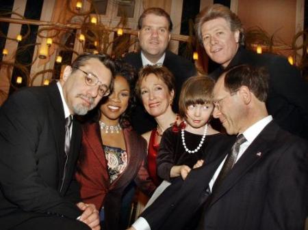 Doctors Michael Zasloff, left, and Fred Kaplan, 
right, pose with Metropolitan Opera stars bass-baritone Bryn Terfel, bass Samuel Ramey, top row left and right, mezzo-soprano 
Denyce Graves and soprano Constance Green, front row second and third from left, and five-year-old Sophia Forshtay at a benefit at New York's Waldorf-Astoria Hotel to help cure Fibrodysplasia Ossificans Progressiva. Photo by Richard Drew