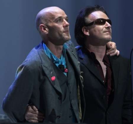 Singers Michael Stipe (L) and Bono at Entertainment Industry Foundation's 