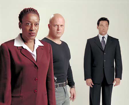 FX's controversial cop series 'The Shield,' stars CCH Pounder(L), Michael Chiklis(C) and Benito Martinez