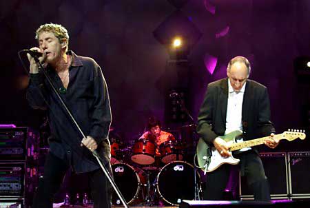 The two surviving members of veteran rock band The Who will carry on with their North American tour despite the June 27, 2002 death of the group's bassist, John Entwistle, the group said June 28. Roger Daltrey(L) and Pete Townsend are seen performing in Chicago June 25, 2000 on their previous North American tour. Photo by Scott Olson