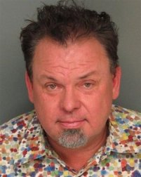 This undated booking photograph provided by the Monterey County Sheriff's Department on Monday, June 14, 2010 shows Thomas Kinkade. Authorities say the California artist spent a night in jail after being arrested on suspicion of drunken driving. California Highway Patrol officials said Monday, June 14, 2010 that Kinkade was pulled outside Carmel and arrested by a CHP officer just after 10 p.m. Friday.