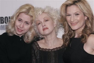 Actors Nellie McKay, left, Cyndi Lauper, center, and Ana Gasteyer of the Broadway production of 'The Threepenny Opera' pose for photographers in New York, Thursday, March 9, 2006. They're getting ready for the Roundabout Theatre Company revival which features Alan Cumming as Mack the Knife; Jim Dale and Gasteyer as Mr. and Mrs. Peachum,McKay as Polly Peachum; and Lauper as Jenny. The Bertolt Brecht-Kurt Weill musical, in a new adaptation by Wallace Shawn, opens April 20 at Studio 54.  Photo by Shiho Fukada