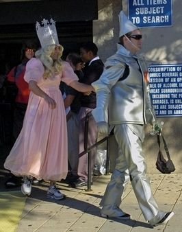 New York Yankees' Phil Hughes is dressed as the Tin Man and Chase Wright, left, is the Good Witch from 'The Wizard of Oz' as they leave the stadium after a baseball game Monday, Sept. 24, 2007, at Yankee Stadium in New York. The rookies had to dress in costumes as they left for a road trip. Photo by Bill Kostroun