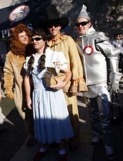 New York Yankees rookie players stand outside Yankee Stadium dressed as characters from the movie 